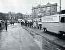 View: y13637 Sheffield and Rotherham Constabulary: Inclement weather failed to damp the spirits of children in the Scholar/Police section of the Mayor's Centenary Parade at Rotherham