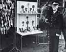 View: y13704 South Yorkshire Police: Constable Frank Clapham, on his retirement, with Princess and the trophies they won together over the years, at police competitions throughout the country 