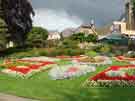 View: a05030 Flower beds in the Botanical Gardens showing (top) Curators House Restaurant, No. 101 Clarkehouse Road 