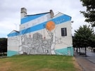 View: a05250 Mural on the back of the Howard Hotel, No. 57 Howard Street by Jo Peel