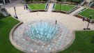 View: a05476 Sheffield Peace Gardens fountains coloured blue to celebrate the 72nd birthday of the National Health Service (NHS)