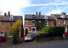 View: a05522 52 Broomgrove Road (the house with the striped panels around the windows and door)