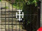 View: a05583 Iron work inspired by the family crest of the Stabler family on the gate of 42 Westbourne Road