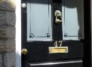 View: a05592 Decorative door knocker on the front Door of No 47 Westbourne Rd 