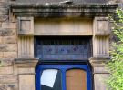 View: a05600 Architectural details over front door of 64 Clarkegrove Road