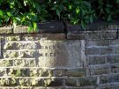 View: a05619 Mackenzie Crescent showing old stone street name off Collegiate Crescent