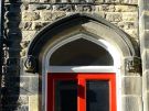 View: a05706 Carved head over the front door of 38 Collegiate Crescent 