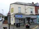 View: a06066 Wine Rack, beers, wines and spirits, No. 341 Sharrow Vale Road at the junction with (left) Cowlishaw Road