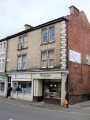 View: a06082 Shops on Machon Bank Road showing (l. to r.) No. 5 Bannerdale Osteopaths and No. 7 Turners Bakers Ltd.