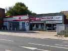 View: a06185 Direct Knitting and Sewing Supplies Ltd., sewing machines and fabrics, Nos. 769 - 771 and Attercliffe Road Post Office, Nos. 765 - 767 Attercliffe Road