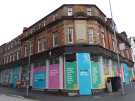 Advertising hoarding publicising Heart of the City II at junction of (left) Wellington Street and (right) Cambridge Street