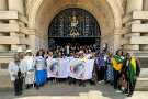 View: a07905 Visitors at the Town Hall for Windrush Day lunch