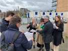 Minister of State, Baroness Neville-Rolfe, being shown a portion of the regeneration work in Sheffield