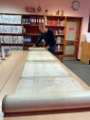 Archives and Heritage Manager, Peter Evans, with the longest document at Sheffield City Archives