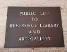 Sign for the lift in the entrance foyer, Central Library, Surrey Street