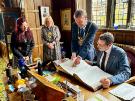 Oberbürgermeister Thomas Eiskirch (sitting) from Bochum, Germany in the Town Hall, Pinstone Street with Lord Mayor, Councillor Colin Ross (2nd right) and Lady Mayoress, Mrs Ross (2nd left)