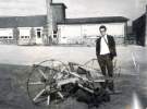 [Possibly teacher with old farm equipment], Dungworth Junior and Infants School, Dungworth Green