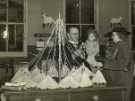 Lord Mayor, Councillor Samuel Hartley Marshall JP and Lady Mayoress, Mrs Marshall with baby on Christmas Day at the Royal Hospital