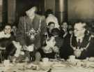 Lord Mayor, Councillor Samuel Hartley Marshall JP and Lady Mayoress, Mrs Marshall entertaining orphan children in the City Hall ballroom 