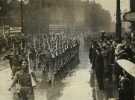 Lord Mayor, Councillor Samuel Hartley Marshall JP and the Lady Mayoress, Mrs Marshall (right) review a march past of soldiers outside the Town Hall during the visit of Airborne Forces to Sheffield