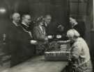 Lord Mayor, Councillor Samuel Hartley Marshall JP and Lady Mayoress, Mrs Marshall drawing their new ration books at the Food Office