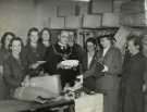 Lord Mayor, Councillor Samuel Hartley Marshall JP and Lady Mayoress, Mrs Marshall visiting a [British] Red Cross packing centre