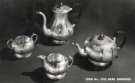 Hand engraved tea and coffee services (with long spouts), E. Leclere, electro plate manufacturer, No. 56 Howard Street