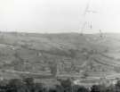 Workmen's huts on the hillside during the construction of the Ewden Valley reservoirs (either More Hall or Broomhead)