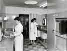 View: h00239 Wet viewing and drying room with (back centre) the dark rooms, Radiography Department, City General Hospital (latterly Northern General Hospital), c.1960