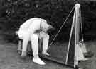 View: h00300 Miner possibly doing neck and back strengthening exercises, Miners Rehabilitation Centre, Royal Infirmary Firbeck Annexe, Firbeck Hall 