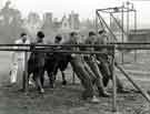 View: h00304 Miners exercising with (left) physiotherapist, Miners Rehabilitation Centre, Royal Infirmary Firbeck Annexe, Firbeck Hall 