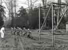 View: h00305 Miners exercising with (left) physiotherapist, Miners Rehabilitation Centre, Royal Infirmary Firbeck Annexe, Firbeck Hall 