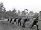 View: h00306 Miners exercising with (right) physiotherapist, Miners Rehabilitation Centre, Royal Infirmary Firbeck Annexe, Firbeck Hall 