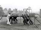 View: h00307 Miners exercising with (left) physiotherapist, Miners Rehabilitation Centre, Royal Infirmary Firbeck Annexe, Firbeck Hall 