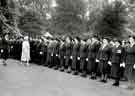 View: h00347 Queen Victoria District Nursing Association nurses at their Centenary Year Review (1859 - 1959) being inspected by Queen Elizabeth, the Queen Mother at Buckingham Palace