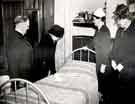 View: h00348 Inspecting a bedroom, Sheffield Queen Victoria District Nursing Association, Johnson Memorial Home, No. 4 Endcliffe Crescent