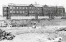 View: h00751 Building site for the Clinical Sciences Centre showing (back) Clock Tower building, Northern General Hospital, Fir Vale