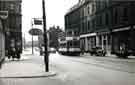 View: p00784 Tram No. 262 on West Street showing (r. to l.) No. 150 Wesley and General Assurance Society, No. 152 Westfield cafe and Nos. 154 - 158 Associated Engineering Ltd.