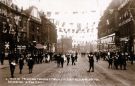 View: p01546 Decorations in High Street for the royal visit of George and Mary, Prince and Princess of Wales (later King George V and Queen Mary) showing (right) No. 40 the Westminster Hotel and restaurant