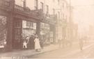 View: p01696 Shops on Glossop Road showing (l. to r.) J. W. Hogg, toy dealer and Johnson Brothers Ltd., dyers and cleaners