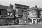 View: ph00071 Attercliffe Common at the junction of Milford Street showing (left) Nos. 385 - 387 former premises of C. H. Hallatt Ltd., chemists; (centre) No. 389 Betty's cafe and (right) used car spares shop, mid 1970s