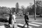 Zebra crossing at Hunters Bar roundabout at junction of Ecclesall Road and Junction Road showing (back centre) Brocco Bank, c.1970s