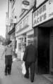 Shops on London Road showing No. 281a Greeting Card Corner, tobacconists and No. 283 Four Ace's Continental Foods Ltd., 1970s