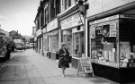 Shops on London Road showing (r. to l.) No. 446 Bodsworth Bros. Ltd., decorators merchants, No. 448 Ian Ashmore, butchers and No. 450 Apollo Domestic Services and (left) No. 451 Fine Fare, supermarket, 1970s