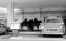 Mounted policemen at unidentified petrol station, c.1970s 