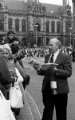 Programme seller at Lord Mayor's Parade, Leopold Street