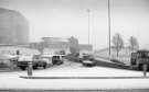 Snow on Park Square roundabout looking towards (centre) Shukers of Sheffield Ltd., motor engineers and commercial motor body builders, Nos.50 - 60 Broad Street and South Street, 1970s