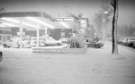 Ecclesall Road in the snow showing (left) National petrol station, 1970s