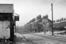 Derelict houses, Sharrow area showing (left) A. Milton and Sons, motor engineers