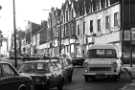 Traffic congestion on London Road showing (right) Nos. 140 - 144 Belton's, kitchen furniture dealers